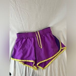 Youth size xl Nike athletic shorts with liner purple